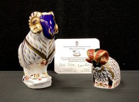 Royal Crown Derby paperweights including; ‘Derby County Ram’, with certification, another Ram (2)