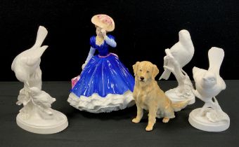 A Royal Copenhagen figure, Golden Retriever, Royal Doulton figure Mary, Hn3375; three Crown