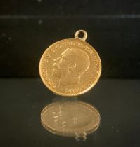 A George IV half Sovereign, 1913, welded mount, 4.1g gross