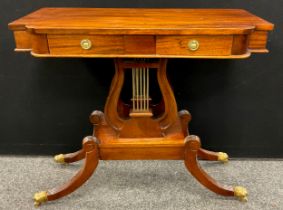A Regency style Mahogany ‘Lyre-pedestal’ side table, break-centre front, pair of short drawers to