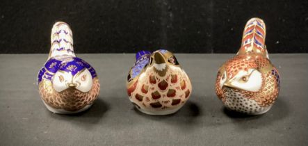 Royal Crown Derby paperweights including; ‘Nut hatch’,’ Wren’, other, mostly silver stoppers (3)