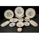A quantity of Poole pottery including bowls, plates, trinket dishes etc