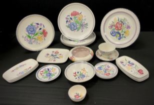 A quantity of Poole pottery including bowls, plates, trinket dishes etc