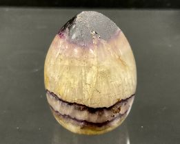 A Blue John Fluorite specimen section, as a cleaved top egg, 38mm high, 28mm diameter.