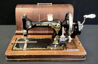 A Frister and Rossmann hand crank sewing machine, serial number. 48225,c.1890