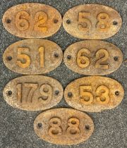 A cast iron oval wagon plate, probably from Colliery or Mine Wagons, each with different cast