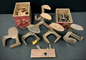 Boxes and objects - A quantity of cast iron cobbler anvil’s, door hinges and handles, rebate plane.