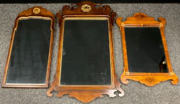 A Reproduction walnut Vauxhall mirror, 98cm high x 53cm; another similar, smaller Vauxhall type