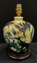 A Moorcroft pottery lamp base, decorated with Bull Rushes and Water Lilies, 20cm high