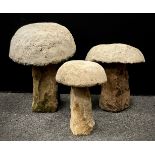 Three graduated staddle stones with reconstituted top, stone base. assorted sizes, largest 53cm (3)