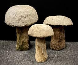 Three graduated staddle stones with reconstituted top, stone base. assorted sizes, largest 53cm (3)