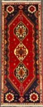 A South West Persian Qashgai runner carpet, hand-knotted with a row of three diamond-shaped