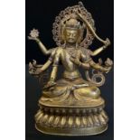 A modern Tibetan style gilt bronze coloured metal Buddhistic figure, Bodhisattva seated, her six