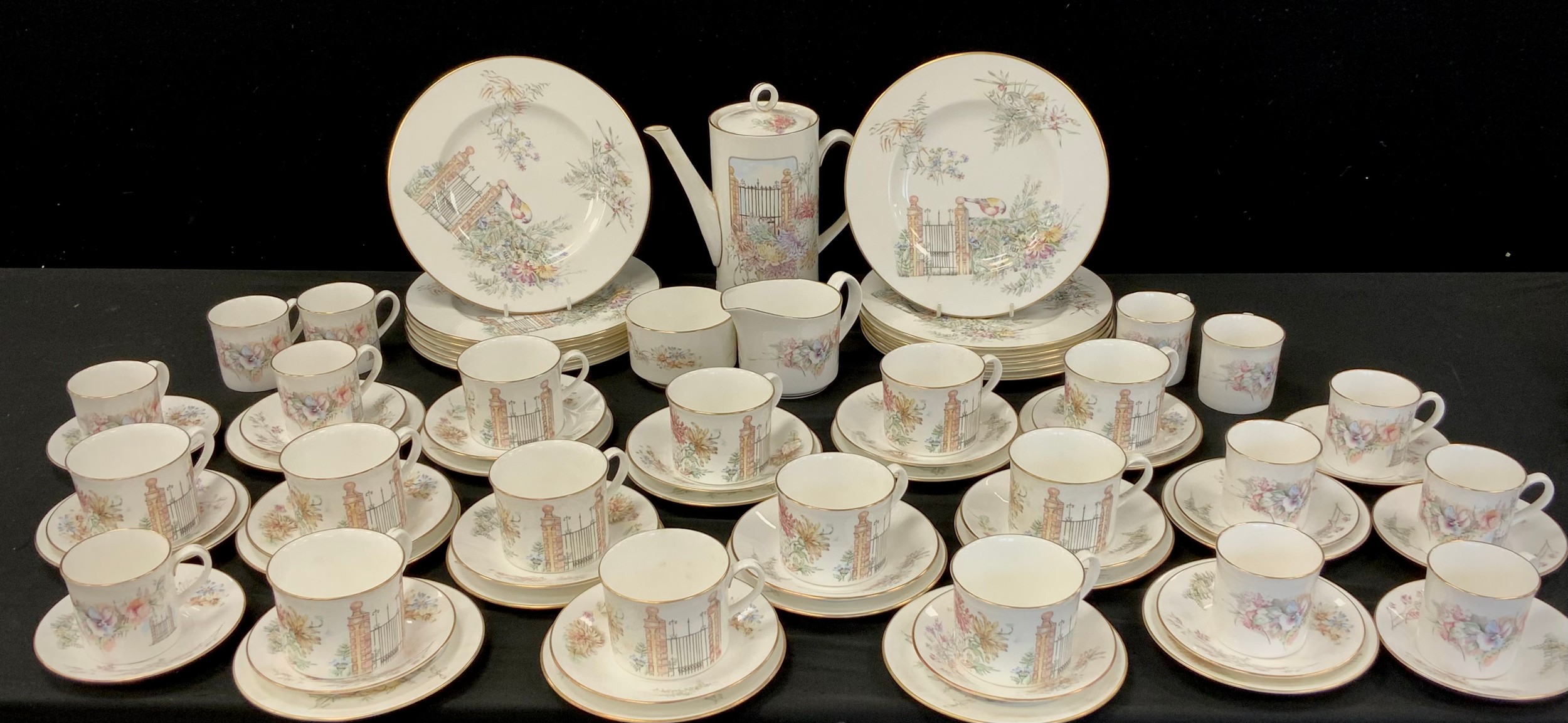 A Royal Worcester table service for twelve including; twelve tea plates, twelve tea cups and
