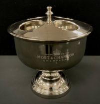 A reproduction silver coloured metal four bottle Moet et Chandon champagne cooler, on stand,37cm