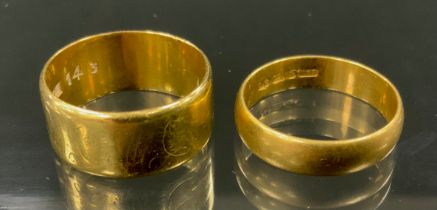 An 18ct gold Wedding band ring, Size N/O, another size O, Birmingham 1972 and Sheffield 1977, 10.