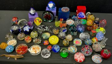 A quantity of 20th century glass paperweights including; Caithness, Millefiori, Mdina, Murano and