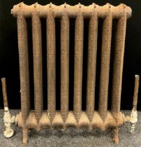 Architectural Salvage - a Victorian cast iron eight section radiator, with rococo style decoration