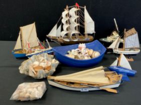 A Novelty stationary model sail boat, others, assorted shells etc