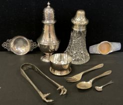 Silver including; silver sugar casters, tea strainer and stand, sugar tongues; etc, approx.407.5 g