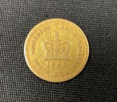 Coins - a George III 1/3rd of a Guinea gold coin, 1801, 2.7g