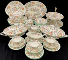 A Minton Haddon Hall pattern dinner set inc two oval tureens and covers, meat plate, two tier cake