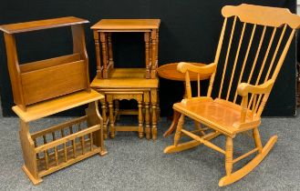 A Beech wood spindle-back rocking chair; nest of three oak side tables; yew wood tripod occasional