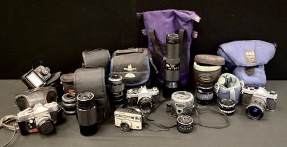 Cameras - Canon AE-1 35mm body, assorted lenses, 50mm, 28mm, 70-200mm, Vivitar 400mm, Sigma 70-