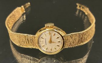 A Garrards lady's 9ct gold cased bracelet wristwatch, London 1975, 14.7g gross