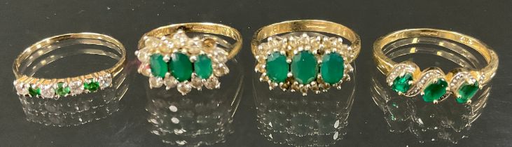 An emerald and diamond effect Cz cluster ring, 9ct gold shanks, sizes S & Q, 6.4g gross; a 9ct