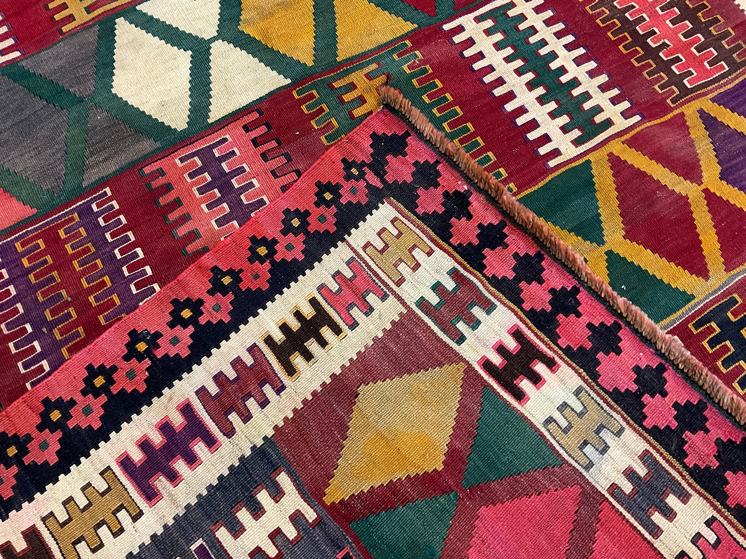 A South West Persian Qashgai Kilim rug, hand-knotted with geometric design in multiple colours, - Image 2 of 2