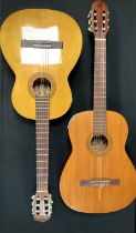 Musical instruments - A Landola C-65 model acoustic guitar, made in Finland; and a Dulcet Classic,