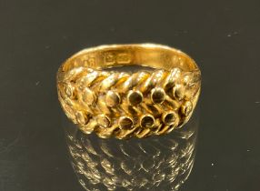 An 18ct gold wheat link ring, size K, 5.1g