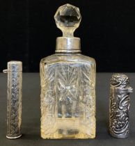 A late Victorian silver scent bottle, embossed floral body, Birmingham 1899, another 1898, both with