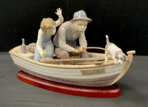 Lladro figure group 'Fishing with Gramps', No.5215, with wooden plinth, marks to base, 44cm long