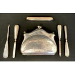 A George V silver evening purse, leather liner, G Norman, Birmingham 1918, 124g gross; a five