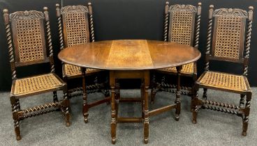 A set of four Jacobean revival dining chairs, carved top rails, barley-twist stretchers and