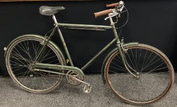 A Hercules Cycles Commuter bike, in green, single speed bicycle.