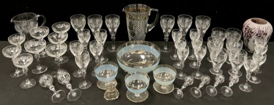 Glassware - A suite of hand engraved drinking glasses inc. wine, sherry, Champagne coups, aperitifs,