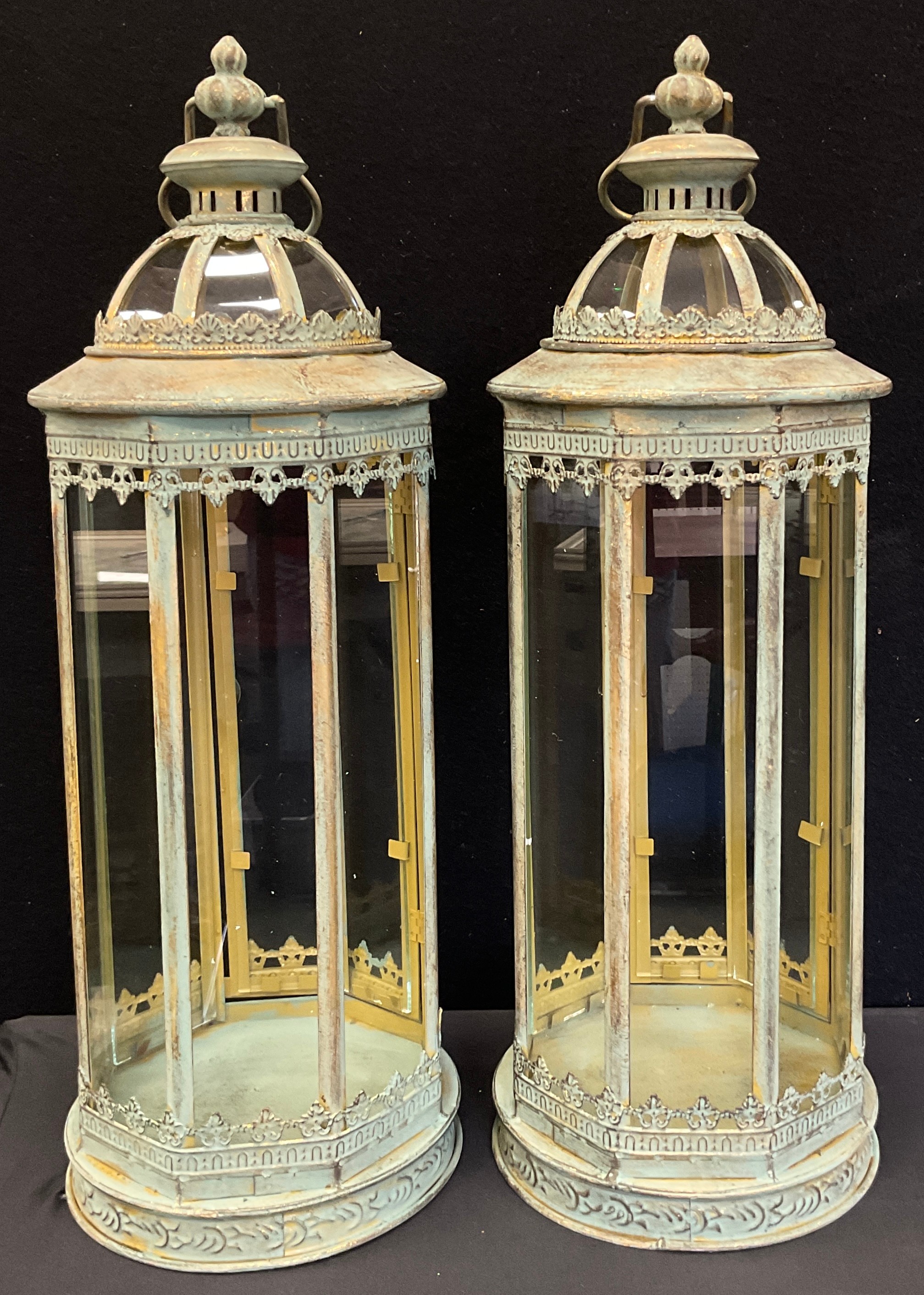A pair of reproduction 19th century style domed top, floor standing lanterns, 60cm high (2)