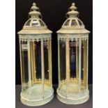 A pair of reproduction 19th century style domed top, floor standing lanterns, 60cm high (2)