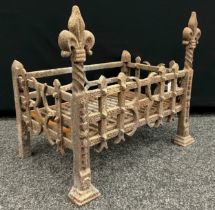 Architectural salvage - A 19th century cast iron fire grate, 45.5cm high x 54.5cm wide x 32.5cm