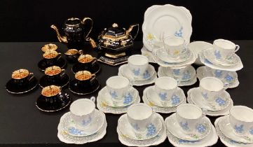 A mid century Royal Grafton tea service for twelve including twelve tea cups and saucers, a a pair