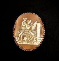 A Victorian oval cameo brooch, as Artistry and companion, within gold coloured metal mount,
