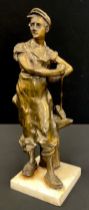 An Bronzed metal figure of a Blacksmith, square alabaster base, 32cm high, early to mid 20th