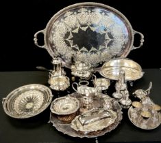 A large oval silver plated tray, salver, three piece tea set, swing handle basket, condiments set,
