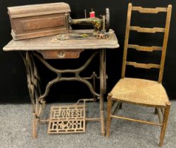 A Jones Vintage treadle sewing machine, the ‘Family Machine’ model, no. 44520, on a cast iron