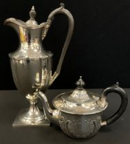 Thomas Bradbury & Sons Ltd silver coffee pot, hardwood handle, Sheffield, 1909,27cm high; a tea pot,