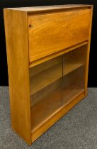 A teak bureau bookcase cabinet, by Herbert E. Gibbs, Autograph Furniture, 113cm high x 91.5cm wide x