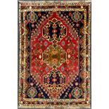 A South West Persian Qashgai rug / carpet, hand-knotted with a central row of three medallions,